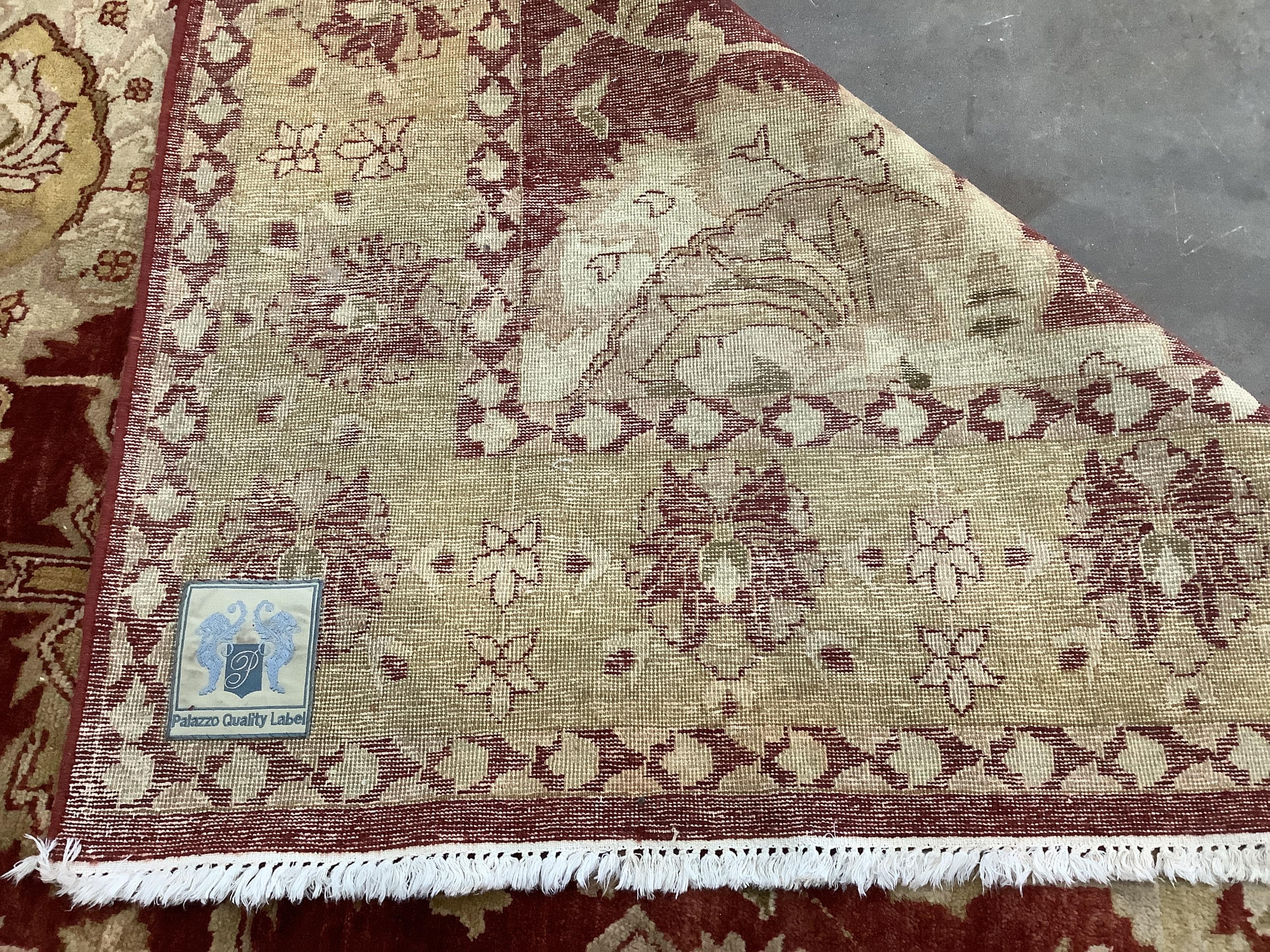 An Oushak carpet, 320 x 240cm. Condition - fair